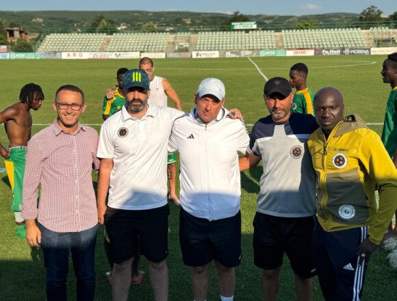 Staff Photo with Ismet Munishi and FC Dukagjini President Fabian Veseli